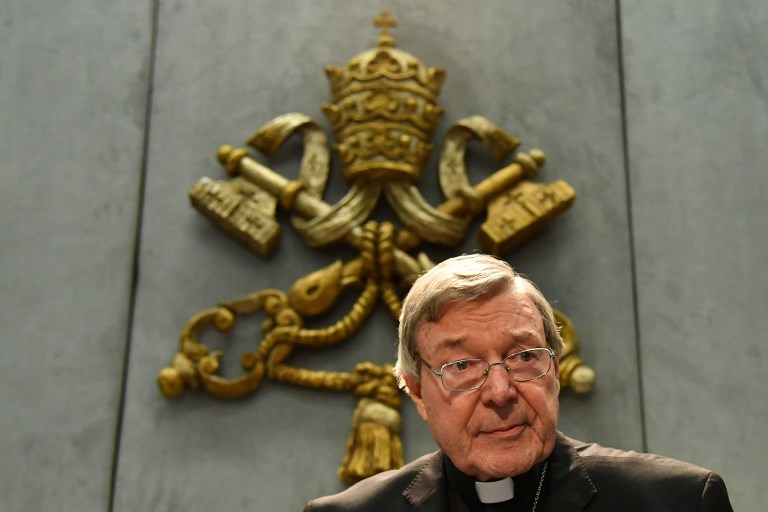 Australian Cardinal George Pell looks on as he makes a statement at the Holy See Press Office, Vatican city on June 29, 2017 after being charged with historical sex offences in a case that has rocked the church. Cardinal George Pell said on June 29 that he would take leave from the Vatican to return to Australia to fight sexual assault charges after being given strong backing from Pope Francis, who has not asked him to resign from his senior Church post. / AFP PHOTO / Alberto PIZZOLI