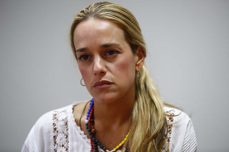 Lilian Tintori, wife of jailed opposition leader Leopoldo Lopez, speaks during an interview with Reuters in Caracas February 24, 2014. Lopez is being held alone in a small cell at a military jail but remains strong and wants his supporters to stay in the streets, his family says.       To match Interview VENEZUELA-PROTESTS/LOPEZ        REUTERS/Jorge Silva (VENEZUELA - Tags: POLITICS CIVIL UNREST HEADSHOT)
