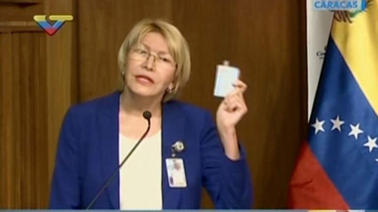 Screen grab from state-owned VTV television broadcast of Venezuela's attorney general Luisa Ortega speaking during the release of her 2016 annual report in Caracas, on March 31, 2017. Venezuela's attorney general surprisingly broke ranks with President Nicolas Maduro on Friday, condemning recent Supreme Court rulings that consolidated the socialist president's power as a "rupture of constitutional order." / AFP PHOTO / VTV / HO