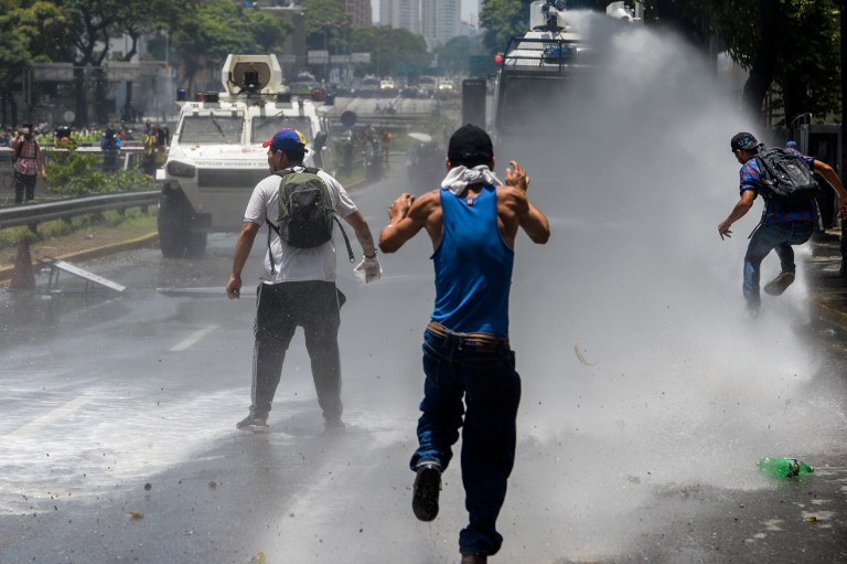 AFP PHOTO / FEDERICO PARRA