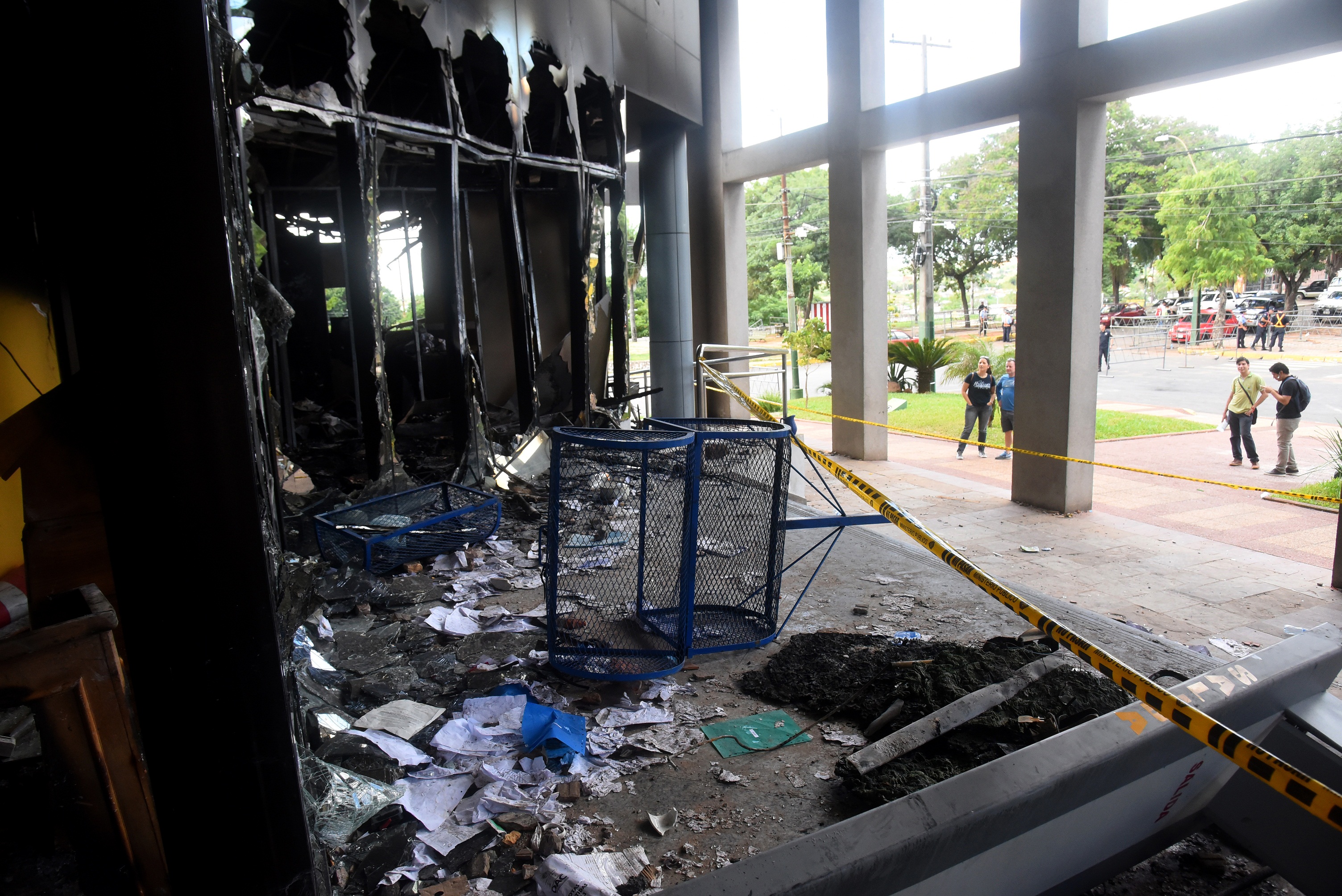 Inside view on April 6, 2017 of the Paraguayan Congress building in Asuncion, parts of which were set on fire on March 31 by demonstrators protesting against the approval of a constitutional amendment for presidential reelection. Paraguayan senators approved a controversial law allowing President Horacio Cartes to seek reelection in 2018, prompting furious protesters to break into the legislature, ransacking lawmakers' offices and starting fires. The unrest left one dead and about 30 people injured, including three lawmakers. / AFP PHOTO / NORBERTO DUARTE