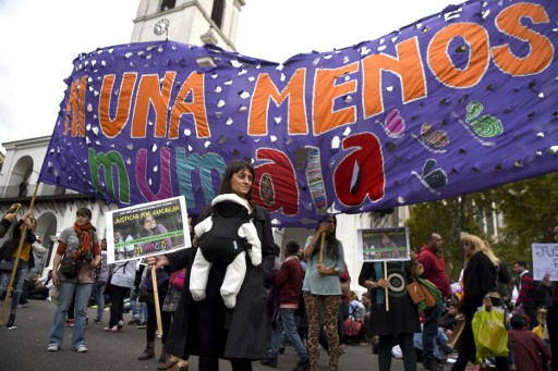 Women demonstrate on April 11, 2017 at Plaza de Mayo square in Buenos Aires against gender violence and in solidarity with Argentina's latest femicide victim, 21-year-old Micaela Garcia, a "Ni Una Menos" (Not One Less) movement activist, whose body was found Saturday in a rural field in Gualeguay, Entre Rios province. A feminicide occurs every 30 hours in Argentina. / AFP PHOTO / EITAN ABRAMOVICH