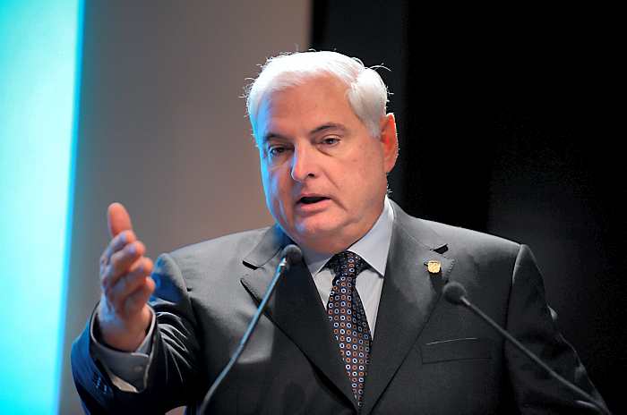 Panamanian President Ricardo Martinelli delivers a speech during a meeting at the French employers association Medef headquarters in Paris on November 18, 2011 as part of his visit to France. AFP PHOTO  ERIC PIERMONT