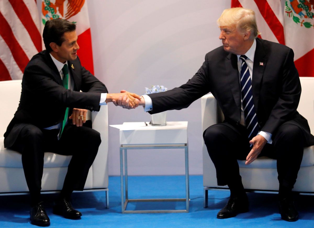 U.S. President Donald Trump shakes hands with Mexico's President Enrique Pena Nieto during the their bilateral meeting at the G20 summit in Hamburg