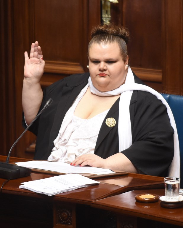 Uruguayan senator Michelle Suarez swears in in Montevideo, on October 10, 2017.   Michelle Suarez is the first transgender lawmaker to have a seat in the Uruguayan parliament. / AFP PHOTO / MIGUEL ROJO