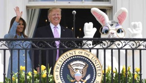 US President Donald Trump and First Lady Melania Trump take part in the annual White House Easter Egg Roll on the South Lawn of the White House in Washington, DC on April 22, 2019. (Photo by Jim WATSON / AFP)